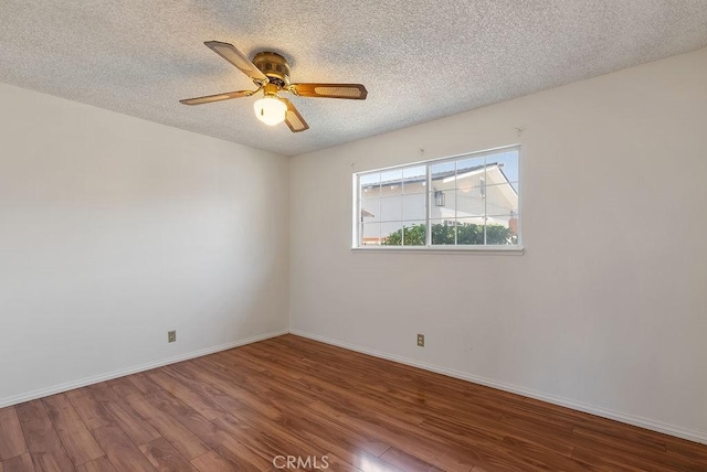 207 N Pasadena Ave, Azusa, CA 91702 - spare room with wood finished floors, a textured ceiling, and a ceiling fan