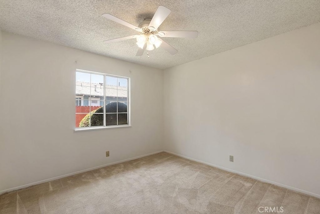 207 N Pasadena Ave, Azusa, CA 91702 - empty room featuring light colored carpet, ceiling fan, and a textured ceiling