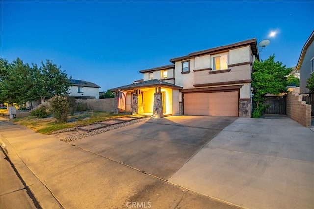 2322 Carolyn Dr, Palmdale, CA 93551 - view of front facade featuring a garage, stucco siding, and concrete driveway