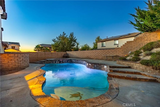 2322 Carolyn Dr, Palmdale, CA 93551 - pool at dusk featuring a fenced backyard and a patio