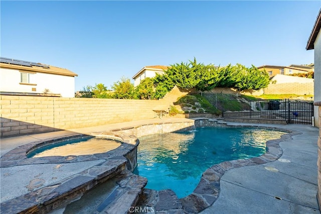 2322 Carolyn Dr, Palmdale, CA 93551 - view of swimming pool featuring a fenced backyard and a pool with connected hot tub