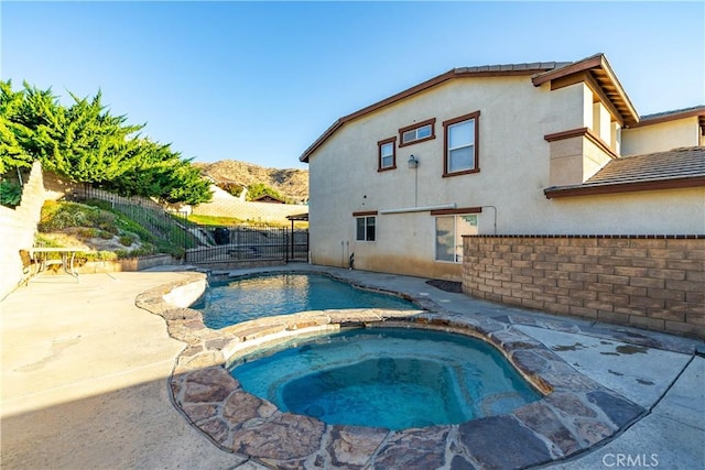 2322 Carolyn Dr, Palmdale, CA 93551 - view of pool with a fenced backyard, a patio, and a pool with connected hot tub
