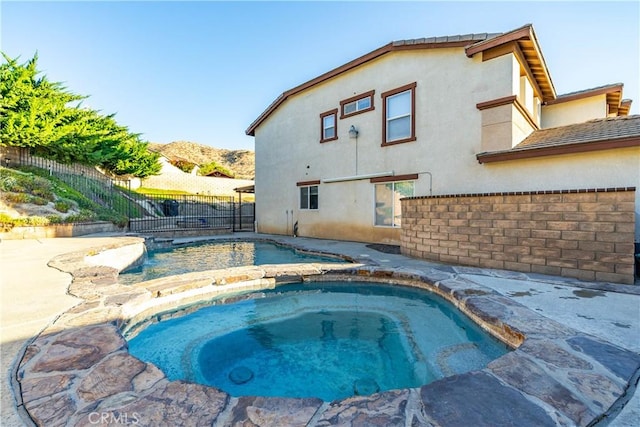 2322 Carolyn Dr, Palmdale, CA 93551 - view of swimming pool with a fenced backyard and an in-ground hot tub