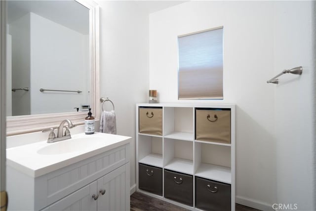 2322 Carolyn Dr, Palmdale, CA 93551 - bathroom with vanity and wood finished floors