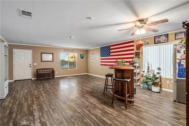 2322 Carolyn Dr, Palmdale, CA 93551 - bar with ceiling fan, ornamental molding, and wood finished floors