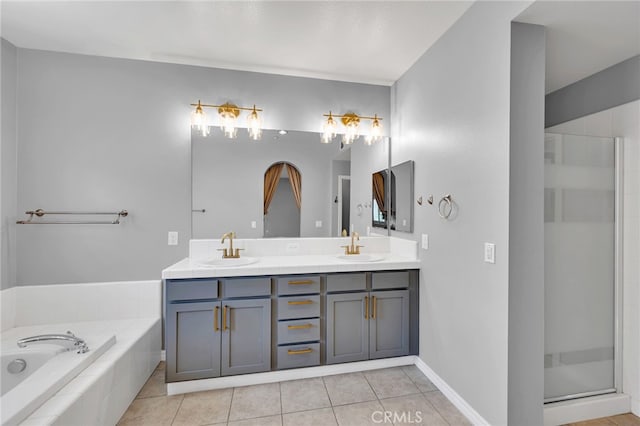 3470 E Temple Way, West Covina, CA 91791 - bathroom featuring double vanity, a bath, tile patterned floors, and a shower stall