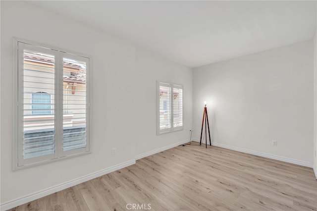 3470 E Temple Way, West Covina, CA 91791 - unfurnished room featuring light wood-type flooring and plenty of natural light