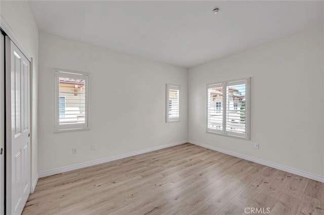 3470 E Temple Way, West Covina, CA 91791 - unfurnished bedroom with light wood-type flooring and a closet
