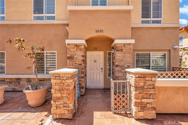 3470 E Temple Way, West Covina, CA 91791 - property entrance featuring stucco siding and stone siding