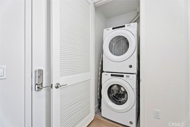 1505 Rivington, Irvine, CA 92612 - laundry room featuring stacked washer and clothes dryer and light wood-style flooring