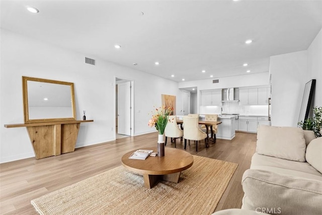 1505 Rivington, Irvine, CA 92612 - living area with light wood finished floors and recessed lighting