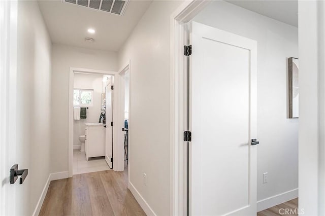 482 Mountain View St, Altadena, CA 91001 - hallway with light wood-style floors and baseboards