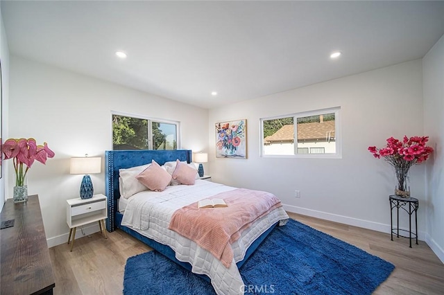 482 Mountain View St, Altadena, CA 91001 - bedroom with multiple windows, wood finished floors, and recessed lighting