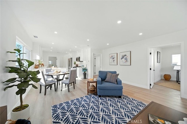 482 Mountain View St, Altadena, CA 91001 - living room featuring light wood finished floors and recessed lighting