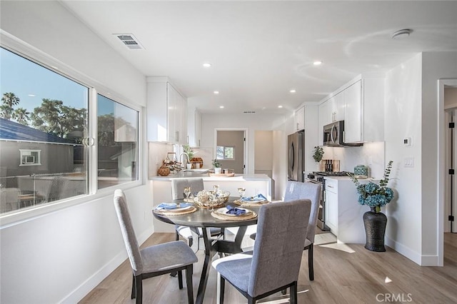 482 Mountain View St, Altadena, CA 91001 - dining area featuring light wood-style floors and recessed lighting