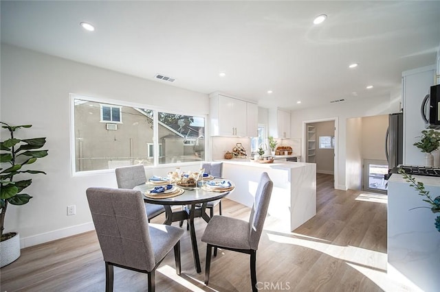 482 Mountain View St, Altadena, CA 91001 - dining area featuring light wood-style flooring and recessed lighting