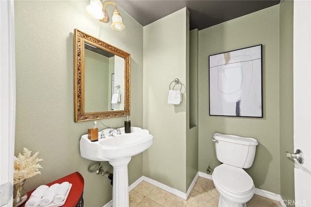 68 E Bay State St Unit 3F, Alhambra, CA 91801 - half bathroom with toilet and tile patterned floors