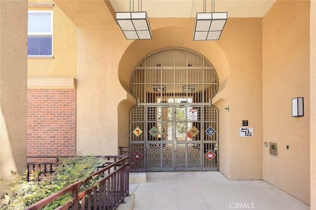 68 E Bay State St Unit 3F, Alhambra, CA 91801 - property entrance featuring stucco siding and brick siding