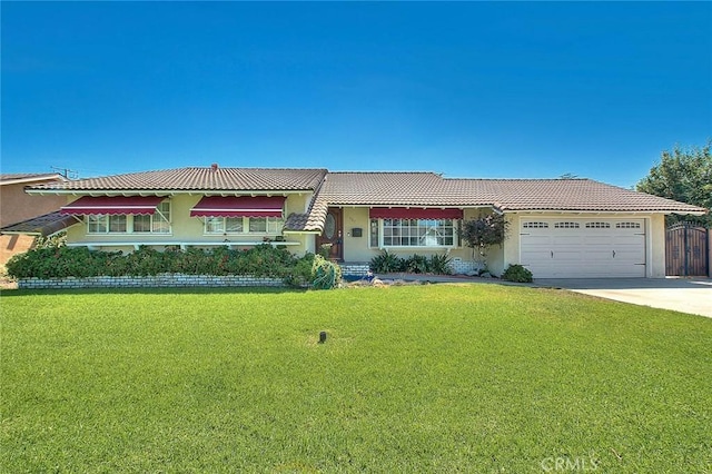 902 W Lucille Ave, West Covina, CA 91790 - view of front of house with stucco siding, an attached garage, driveway, and a tiled roof