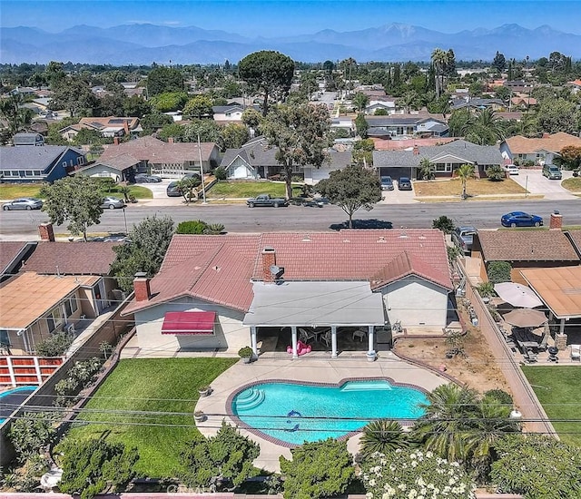 902 W Lucille Ave, West Covina, CA 91790 - aerial view of residential area with a mountainous background and a pool