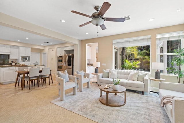 3463 Corte Fresa, Carlsbad, CA 92009 - living room with recessed lighting, light carpet, and a ceiling fan