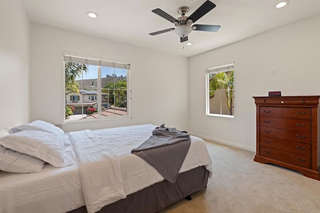 3463 Corte Fresa, Carlsbad, CA 92009 - bedroom featuring multiple windows, light carpet, recessed lighting, and a ceiling fan