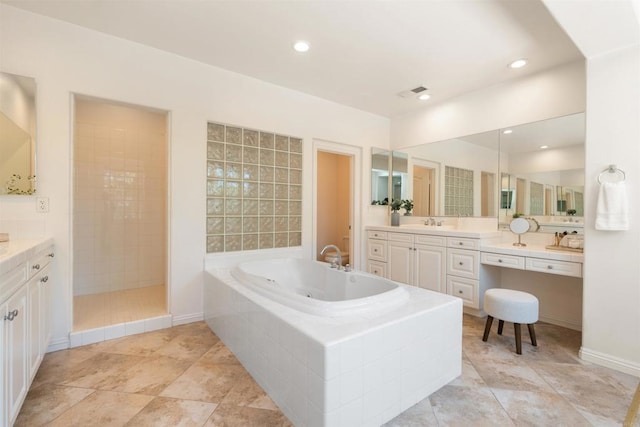 3463 Corte Fresa, Carlsbad, CA 92009 - bathroom with a jetted tub, vanity, recessed lighting, and tiled shower