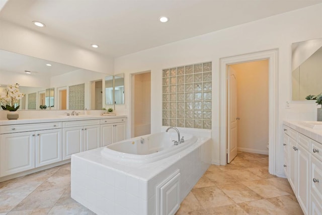 3463 Corte Fresa, Carlsbad, CA 92009 - bathroom featuring a garden tub, vanity, and recessed lighting