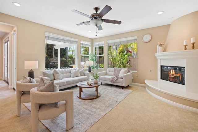 3463 Corte Fresa, Carlsbad, CA 92009 - living area with light carpet, a large fireplace, a ceiling fan, and recessed lighting