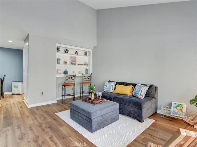 3010 Associated Rd Unit 133, Fullerton, CA 92835 - living room featuring wood finished floors and recessed lighting