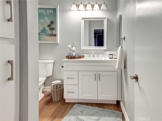 3010 Associated Rd Unit 133, Fullerton, CA 92835 - half bathroom with wood finished floors and vanity