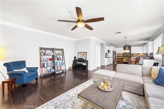 7133 Brisas Ct, Rancho Cucamonga, CA 91739 - living room with dark wood-style floors, a ceiling fan, crown molding, and recessed lighting