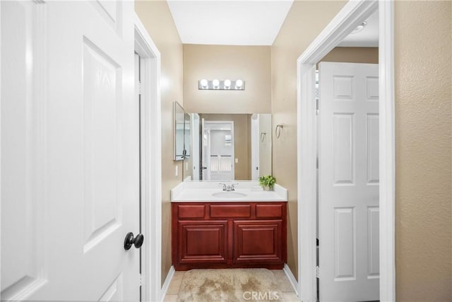 7133 Brisas Ct, Rancho Cucamonga, CA 91739 - bathroom with vanity and baseboards