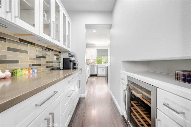 7133 Brisas Ct, Rancho Cucamonga, CA 91739 - bar with beverage cooler, tasteful backsplash, dark wood-type flooring, recessed lighting, and dishwasher