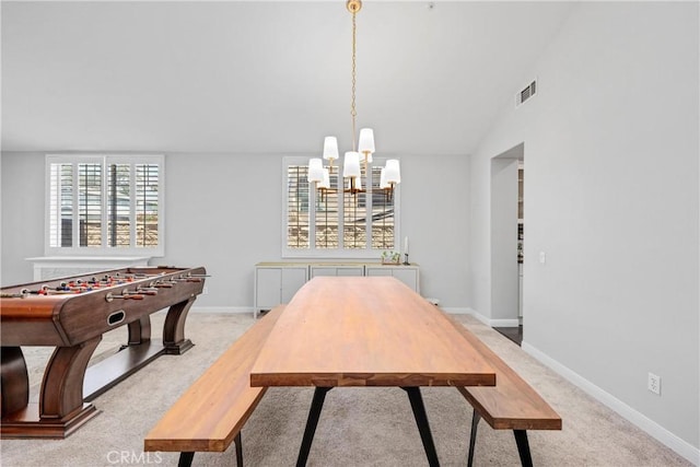 7133 Brisas Ct, Rancho Cucamonga, CA 91739 - dining area featuring a chandelier and light carpet