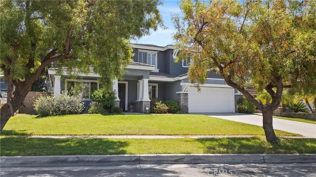 7133 Brisas Ct, Rancho Cucamonga, CA 91739 - view of front of property with driveway, a front yard, and stucco siding