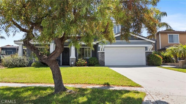 7133 Brisas Ct, Rancho Cucamonga, CA 91739 - view of front of home featuring a garage, concrete driveway, stone siding, and a front yard