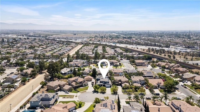 7133 Brisas Ct, Rancho Cucamonga, CA 91739 - aerial view of property's location with nearby suburban area and a mountain backdrop