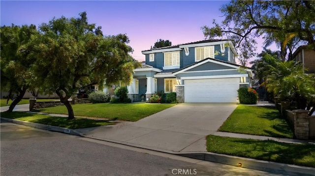 7133 Brisas Ct, Rancho Cucamonga, CA 91739 - view of front of home featuring a garage, a front lawn, and driveway
