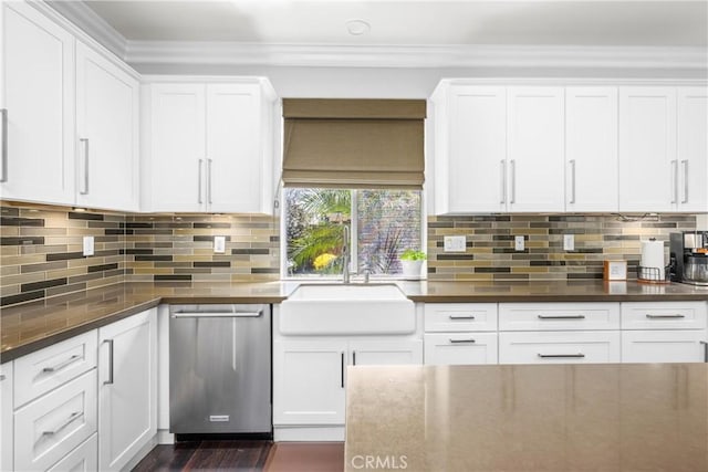7133 Brisas Ct, Rancho Cucamonga, CA 91739 - kitchen featuring stainless steel dishwasher, white cabinets, tasteful backsplash, crown molding, and dark stone countertops