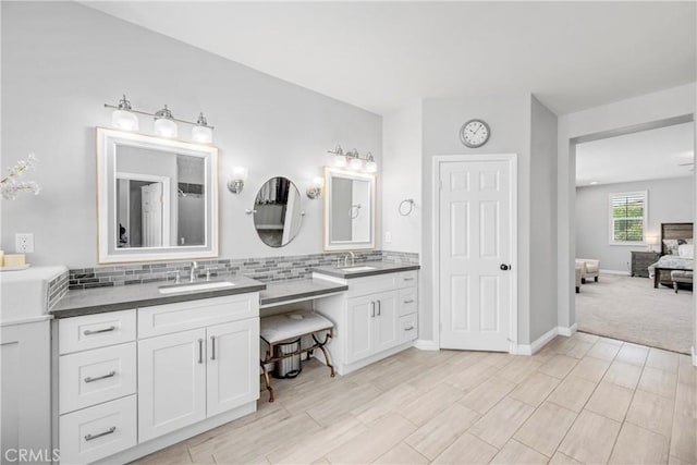 7133 Brisas Ct, Rancho Cucamonga, CA 91739 - full bathroom featuring double vanity, ensuite bath, and tasteful backsplash