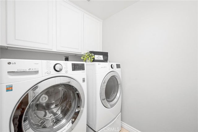7133 Brisas Ct, Rancho Cucamonga, CA 91739 - laundry room with cabinet space and washing machine and clothes dryer