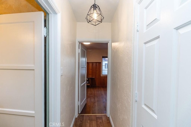 1417 Highland Ave, Needles, CA 92363 - hallway featuring dark wood-style flooring and a textured wall