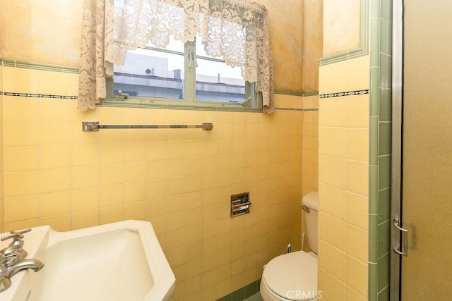 1417 Highland Ave, Needles, CA 92363 - bathroom with tile walls and a shower stall