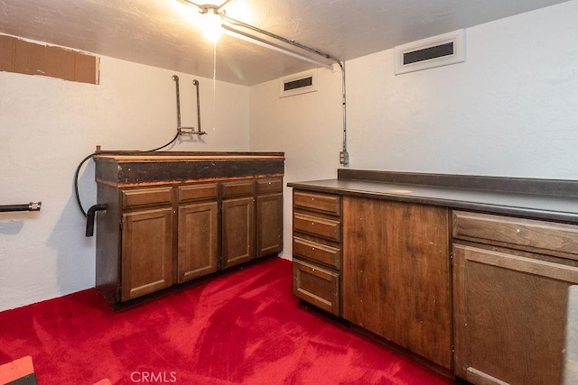 1417 Highland Ave, Needles, CA 92363 - bar featuring dark carpet