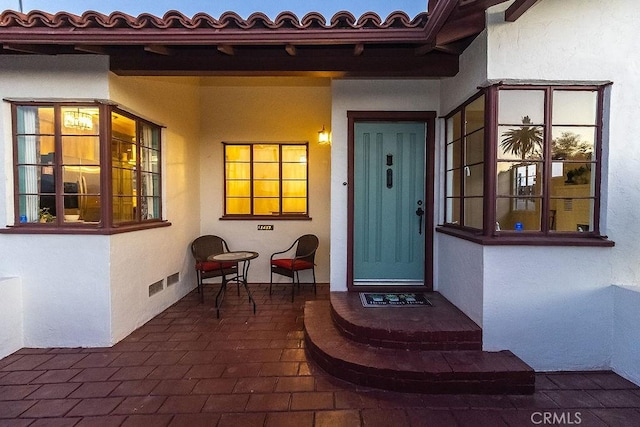 1417 Highland Ave, Needles, CA 92363 - doorway to property featuring stucco siding