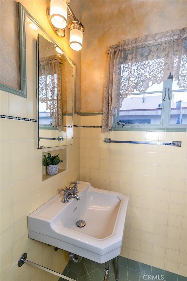 1417 Highland Ave, Needles, CA 92363 - bathroom featuring tile walls and a sink