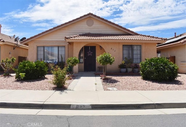 813 Cortez Dr, Hemet, CA 92545 - view of front facade featuring a tile roof and stucco siding