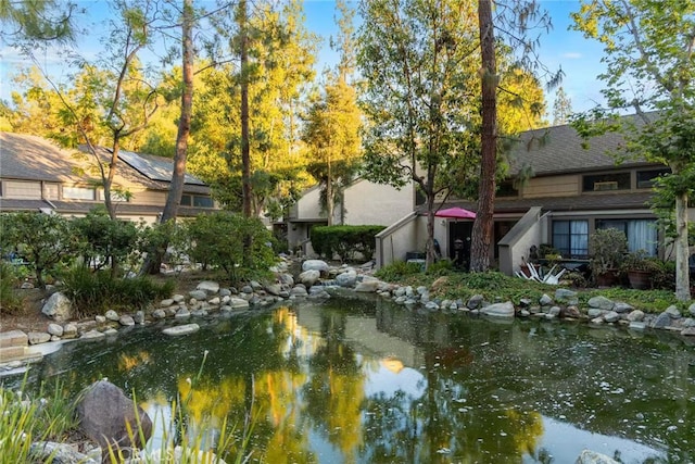 1696 Shady Brook Dr Unit 14, Fullerton, CA 92831 - view of property's community with a garden pond