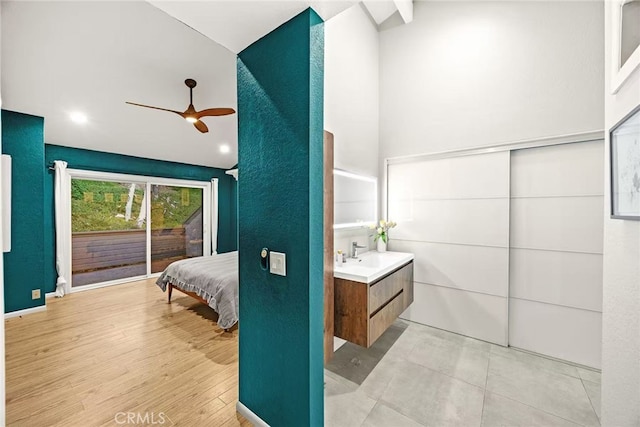 1696 Shady Brook Dr Unit 14, Fullerton, CA 92831 - bedroom with access to outside, a high ceiling, and light wood-style floors